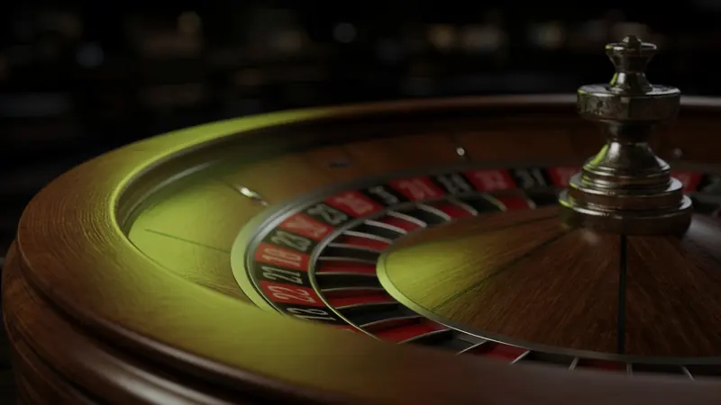 A roulette wheel sits on the LakhBet live guide.