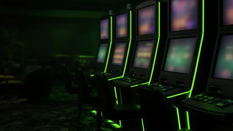 A dark row of slot cabinets appears in the LakhBet guide to Wolf Gold.